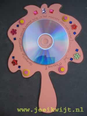 Minst karton Goed Spiegel van een CD of DVD.